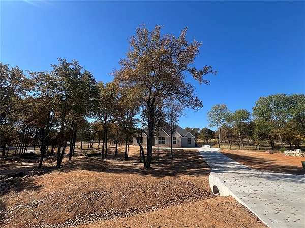 2 Acres of Residential Land with Home for Sale in Poolville, Texas