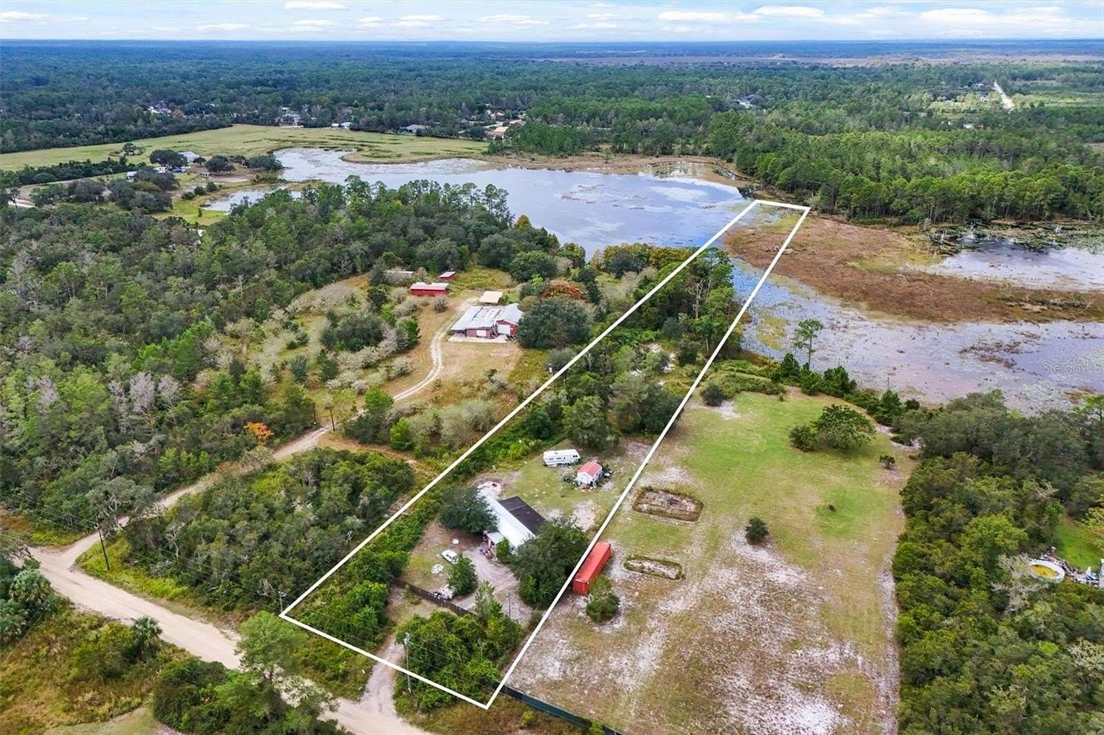 3 Acres of Residential Land with Home for Sale in DeLand, Florida