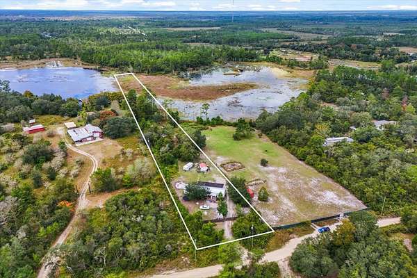 3 Acres of Residential Land with Home for Sale in DeLand, Florida