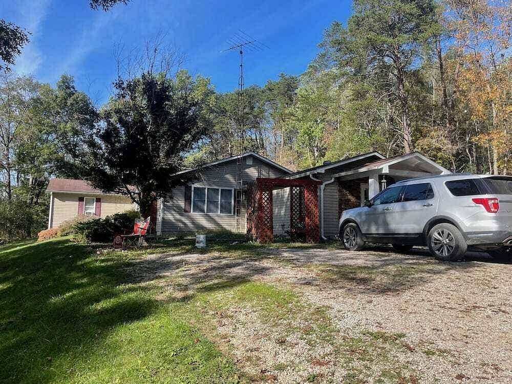 11.1 Acres of Land with Home for Auction in Jackson, Ohio