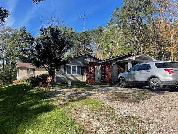 11.1 Acres of Land with Home for Auction in Jackson, Ohio