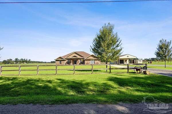 5 Acres of Land with Home for Sale in Pace, Florida