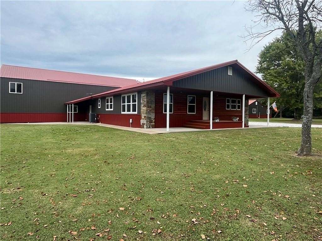 5.36 Acres of Residential Land with Home for Sale in Seligman, Missouri