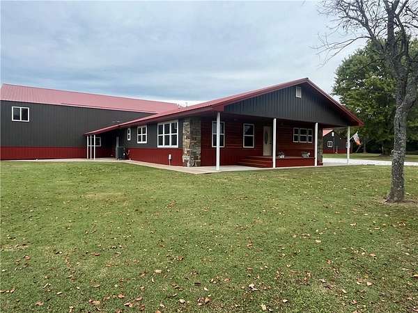 5.36 Acres of Residential Land with Home for Sale in Seligman, Missouri