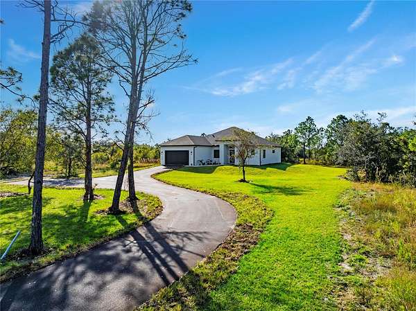 2.58 Acres of Residential Land with Home for Sale in Naples, Florida