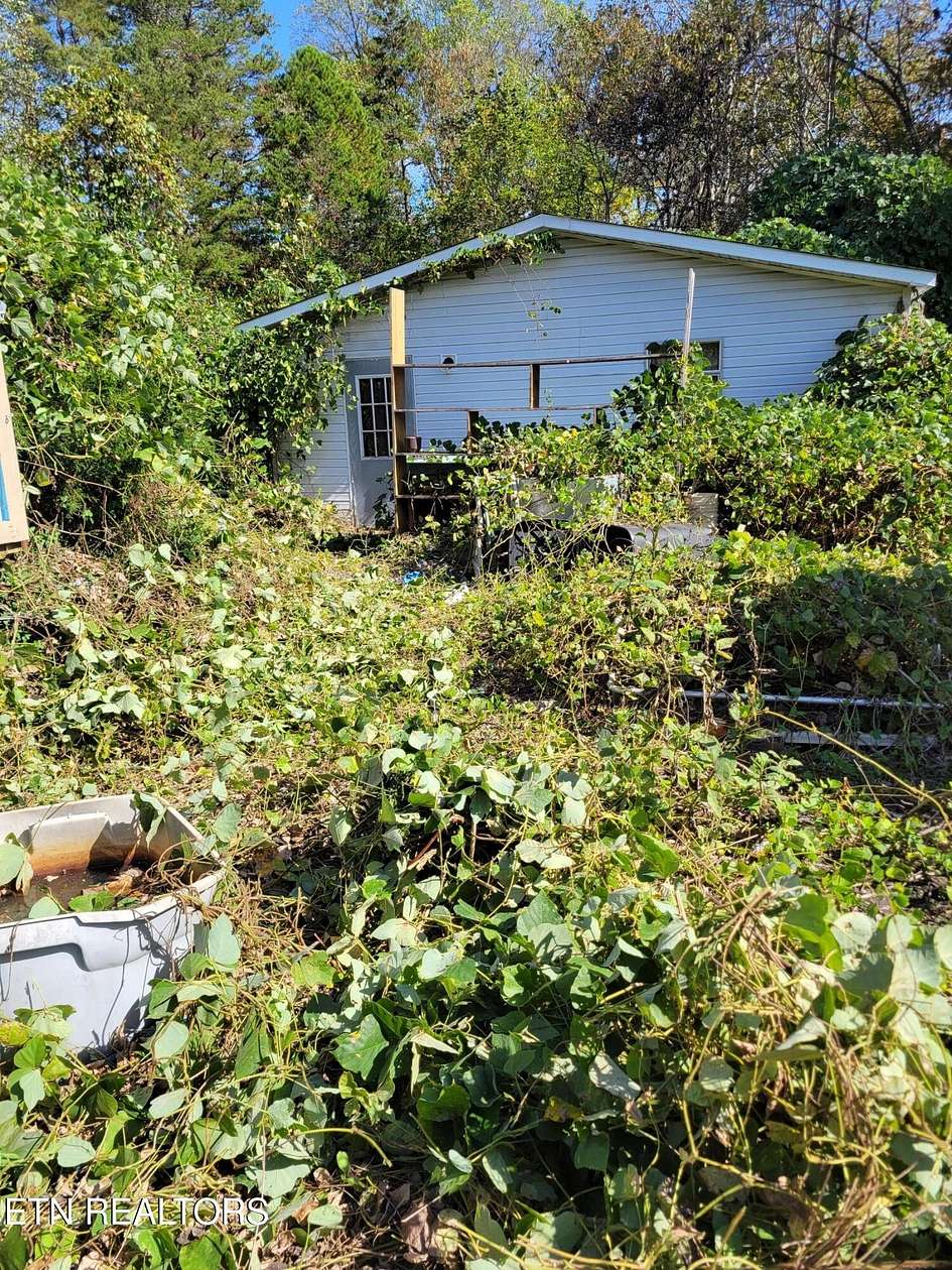 2.4 Acres of Residential Land with Home for Sale in Knoxville, Tennessee