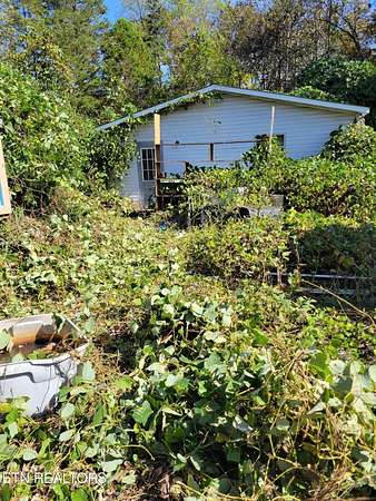 2.4 Acres of Residential Land with Home for Sale in Knoxville, Tennessee