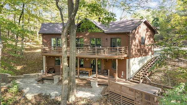 1.5 Acres of Residential Land with Home for Sale in Hide-A-Way Hills, Ohio