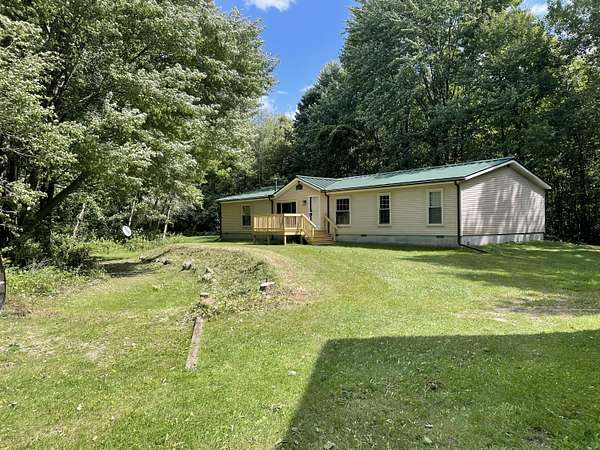 5.13 Acres of Residential Land with Home for Sale in Carsonville, Michigan