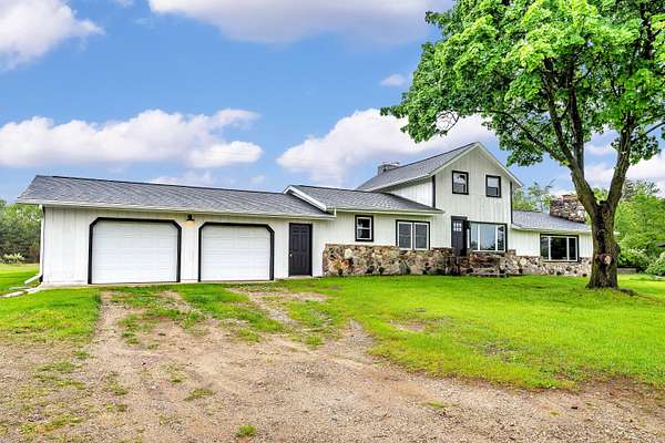 3.5 Acres of Residential Land with Home for Sale in Grant, Michigan