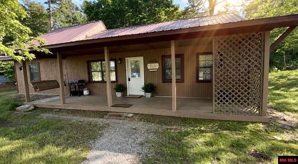 2 Acres of Land with Home for Sale in Pineville, Arkansas