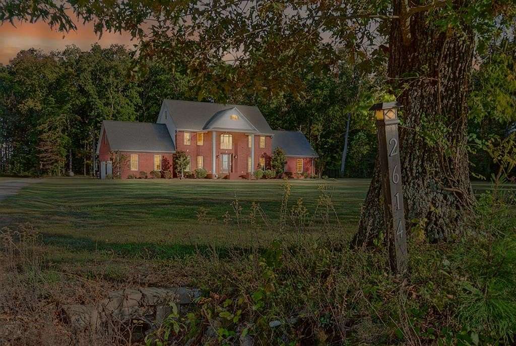 5 Acres of Land with Home for Sale in Puryear, Tennessee