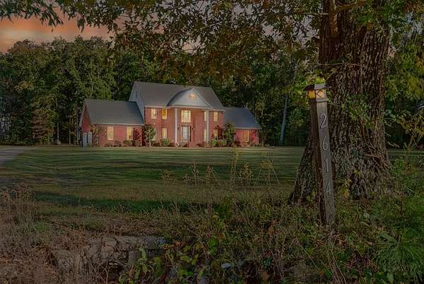 5 Acres of Land with Home for Sale in Puryear, Tennessee