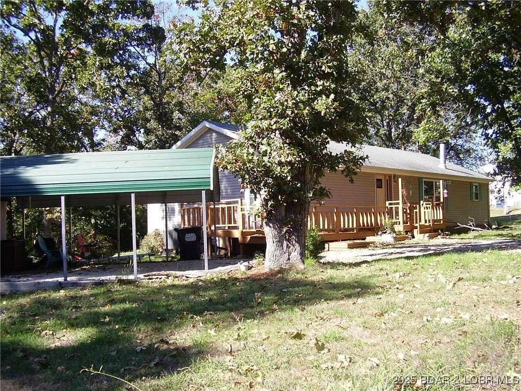 2.4 Acres of Residential Land with Home for Sale in Gravois Mills, Missouri