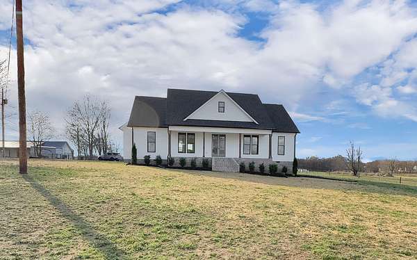 2.39 Acres of Land with Home for Sale in Castalian Springs, Tennessee