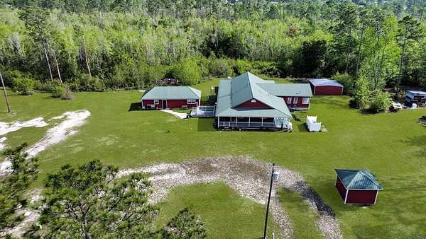 3 Acres of Residential Land with Home for Sale in Wewahitchka, Florida