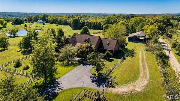 4.2 Acres of Residential Land with Home for Sale in Marble Hill, Missouri