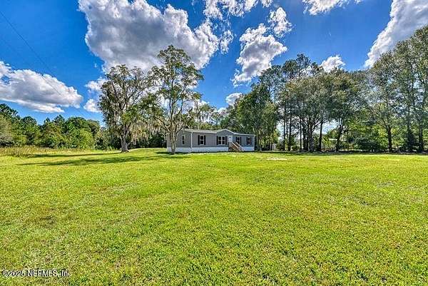 5 Acres of Residential Land with Home for Sale in Starke, Florida