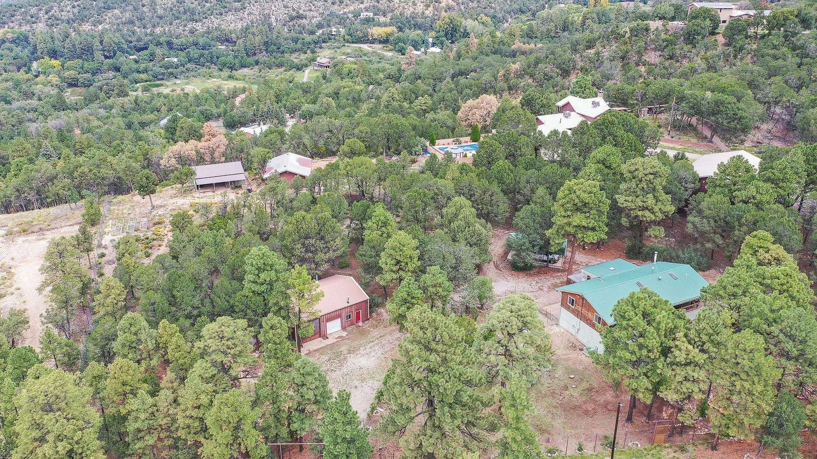 2.5 Acres of Residential Land with Home for Sale in High Rolls, New Mexico