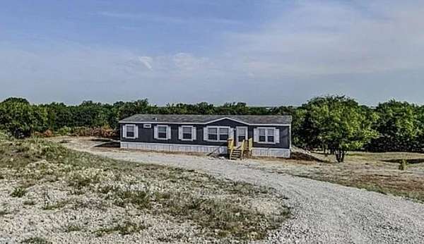 4 Acres of Residential Land with Home for Sale in Rhome, Texas