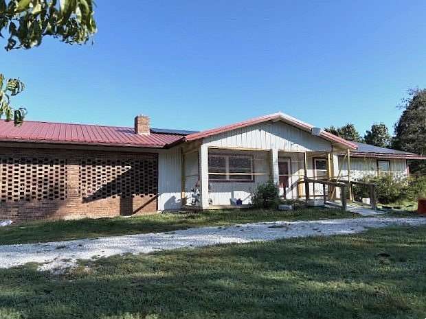7.48 Acres of Land with Home for Sale in Harrison, Arkansas