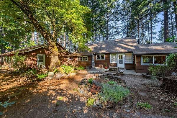 4.17 Acres of Residential Land with Home for Sale in Cave Junction, Oregon