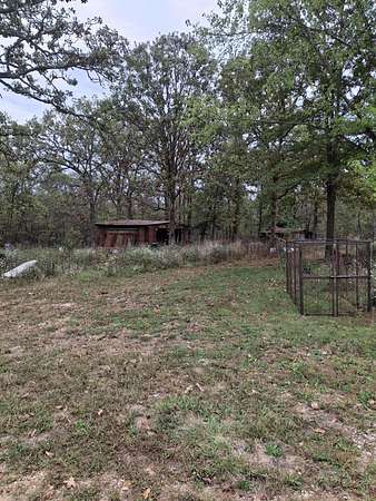 12.2 Acres of Land with Home for Sale in Humansville, Missouri