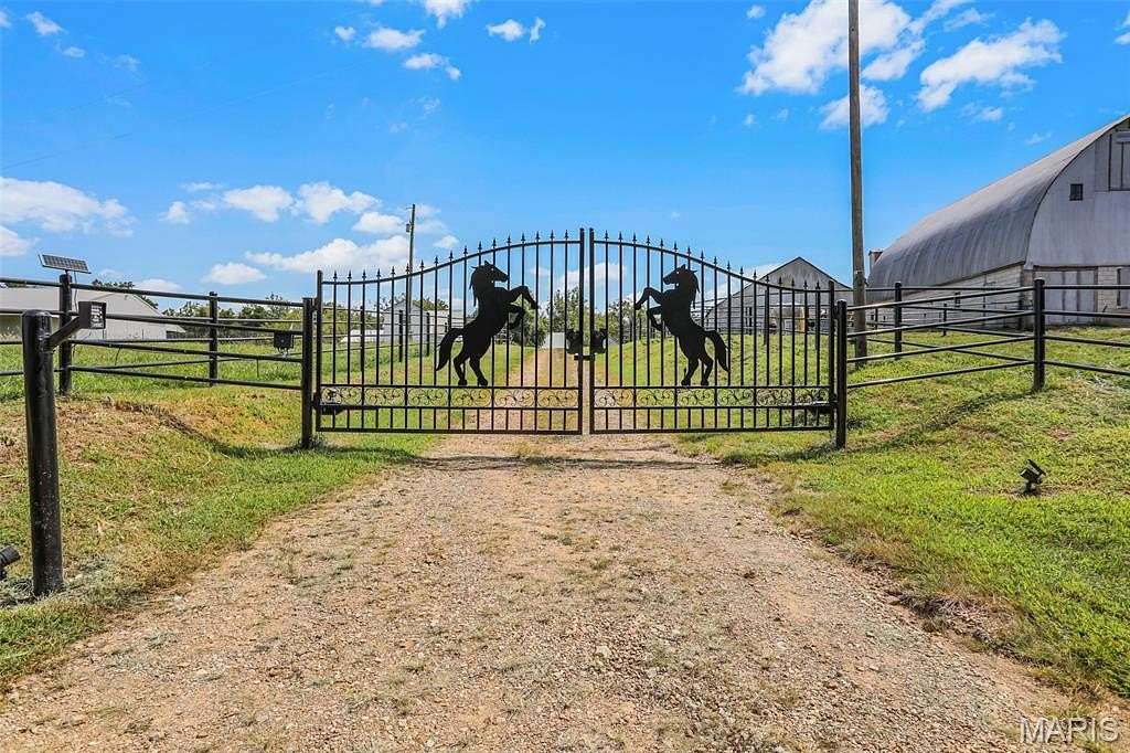 63.7 Acres of Agricultural Land with Home for Sale in New Haven, Missouri