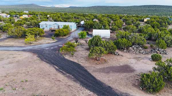 10 Acres of Land with Home for Sale in Concho, Arizona