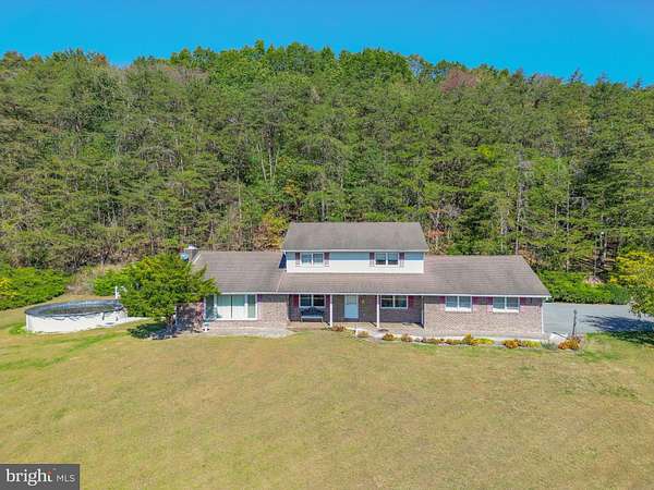 13.1 Acres of Recreational Land with Home for Auction in McClure, Pennsylvania