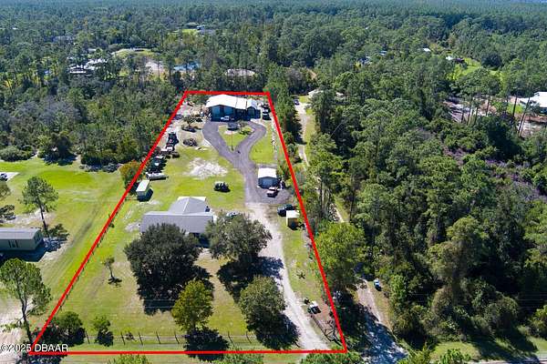 2.5 Acres of Residential Land with Home for Sale in New Smyrna Beach, Florida