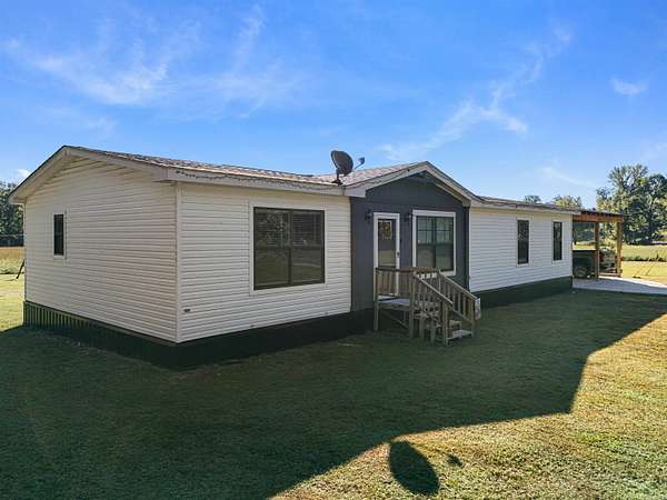 5 Acres of Residential Land with Home for Sale in Jessieville, Arkansas