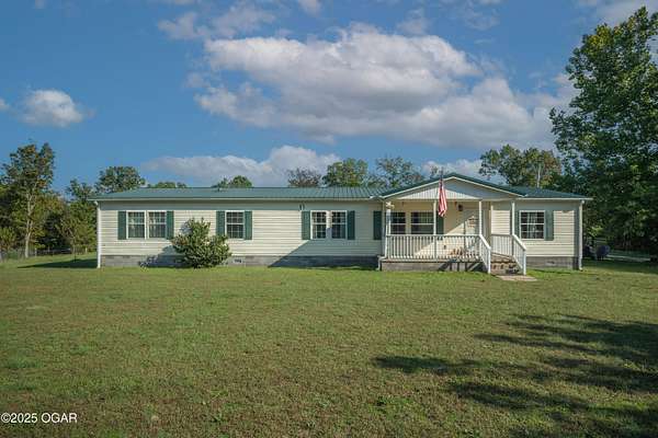 2 Acres of Residential Land with Home for Sale in Goodman, Missouri