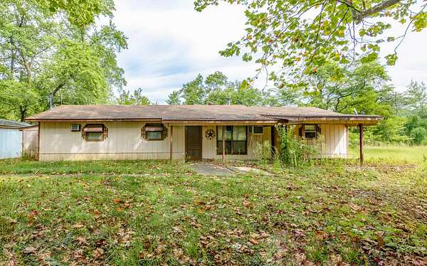 5.16 Acres of Residential Land with Home for Sale in Seligman, Missouri