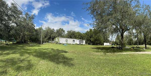 3.5 Acres of Residential Land with Home for Sale in Brooksville, Florida