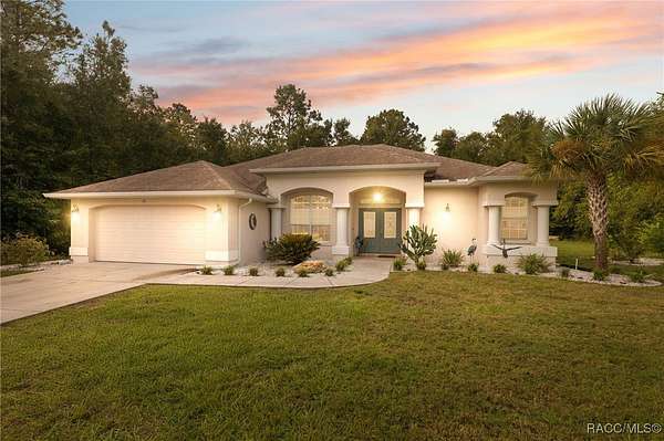 0.56 Acres of Residential Land with Home for Sale in Homosassa, Florida