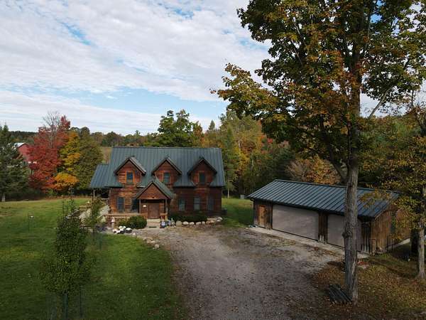 20 Acres of Recreational Land with Home for Sale in Barton City, Michigan