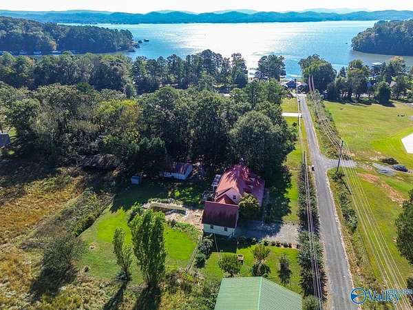 4.9 Acres of Residential Land with Home for Sale in Scottsboro, Alabama