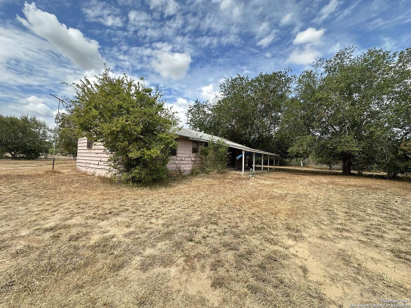 1.64 Acres of Residential Land with Home for Sale in Atascosa, Texas