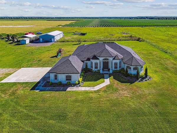 12.6 Acres of Land with Home for Sale in Wimauma, Florida