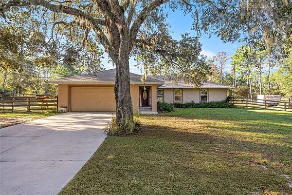 2.32 Acres of Residential Land with Home for Sale in Dunnellon, Florida