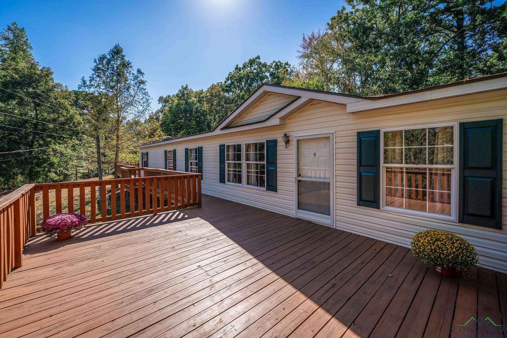 4.9 Acres of Residential Land with Home for Sale in Longview, Texas