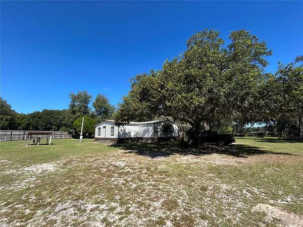 5 Acres of Land with Home for Sale in Polk City, Florida