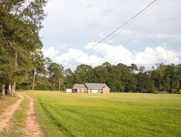 5 Acres of Residential Land with Home for Sale in McComb, Mississippi