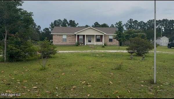 2.2 Acres of Residential Land with Home for Sale in Kiln, Mississippi