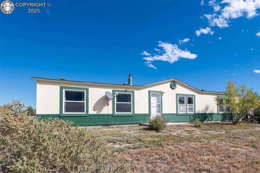 10 Acres of Land with Home for Sale in Penrose, Colorado