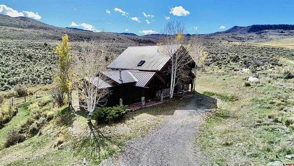 40 Acres of Recreational Land with Home for Sale in Cimarron, Colorado