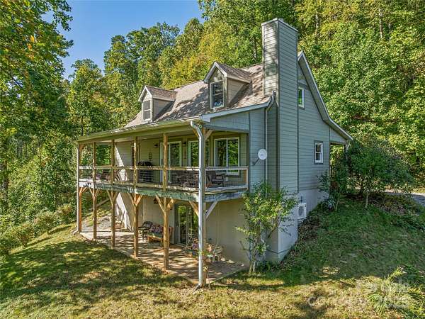 15.5 Acres of Land with Home for Sale in Candler, North Carolina