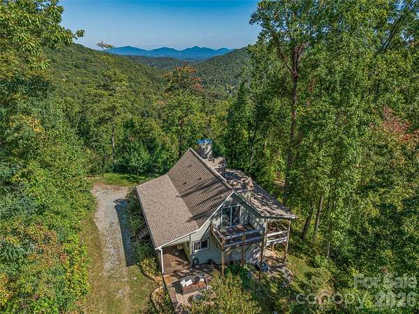 15.5 Acres of Land with Home for Sale in Candler, North Carolina