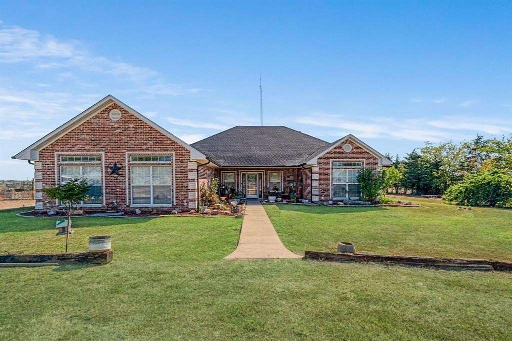 37.4 Acres of Land with Home for Sale in Deport, Texas